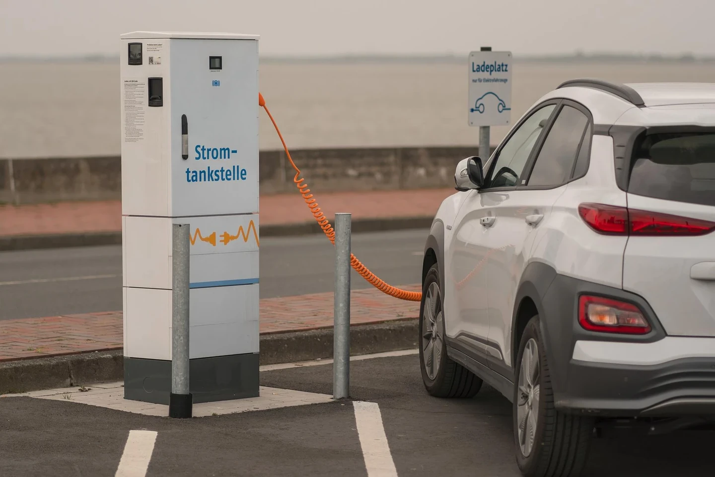 Electric car at a charging station